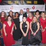 Group photo of event staff with Gary and Jodi Michel.