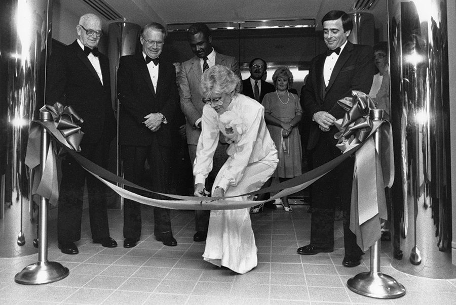 Dale Halton cuts the ribbons at an opening ceremony