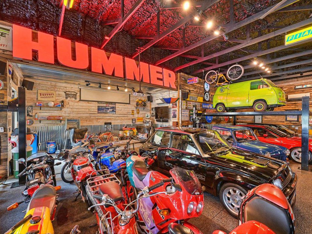 The custom garage in this south Charlotte home holds 24 vintage cars.