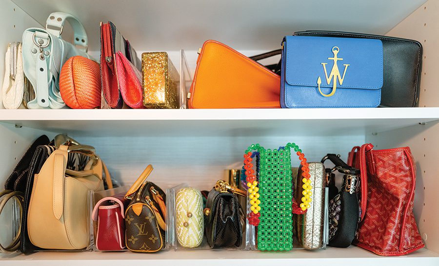 Colorful purses on the shelves of Jenn Waugh's closet in the November issue of SouthPark magazine.