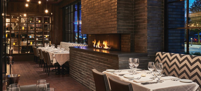 Featured image inside Steak 48 in SouthPark with the fireplace