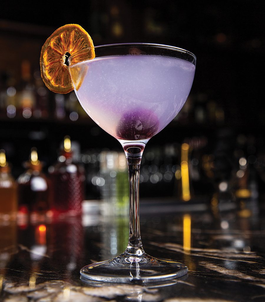The purple-hued classic Aviation cocktail was invented by New York bartender and cocktail book author Hugo Enslinn prior to Prohibition.