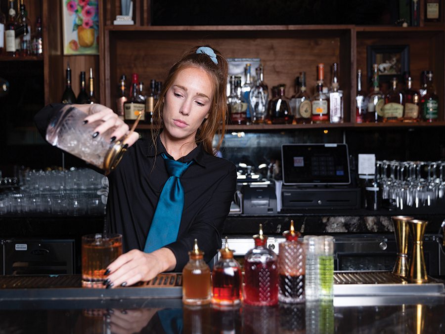 Bartender Katelyn Gold makes a Bar One Old Fashioned at Bar One Lounge in SouthPark.