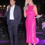 Auctioneer Dr. Nick Calvin and Molly Grantham.