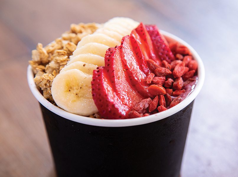 Bowl with strawberries, bananans and granola from Clean Juice in Charlotte.