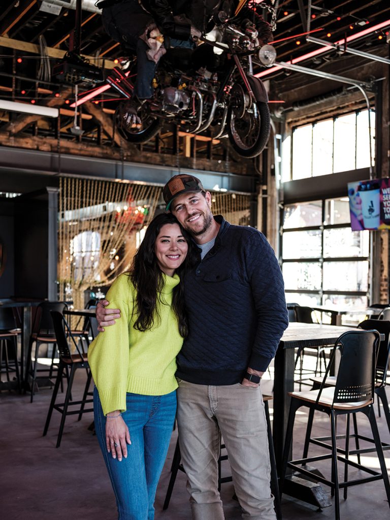 Amanda and Phillip McLamb standing together at Resident Culture Brewing in Plaza Midwood.