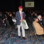 Adam Currie collects donations.