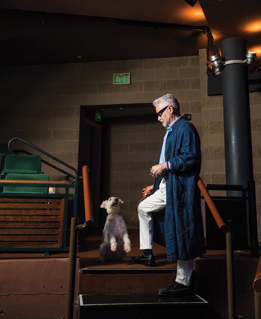 Wesley A. Mancini and his dog backstage at Booth Playhouse during a photo shoot for SouthPark Magazine.