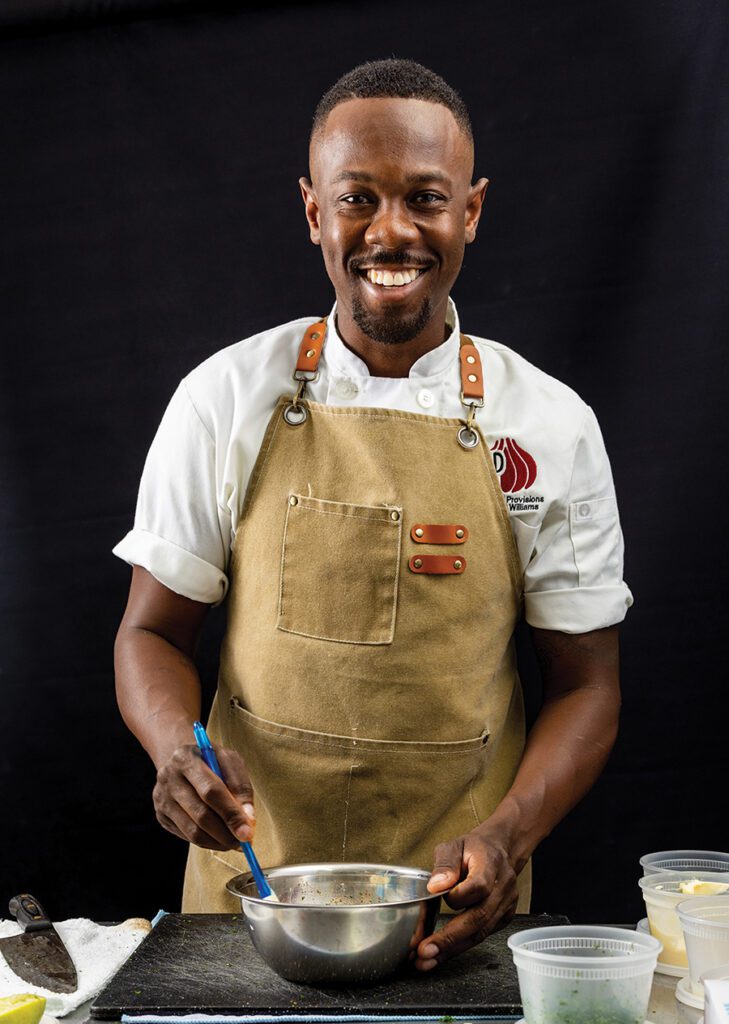 Chef Will Williams mixes ingredients for this crab cakes with shrimp.