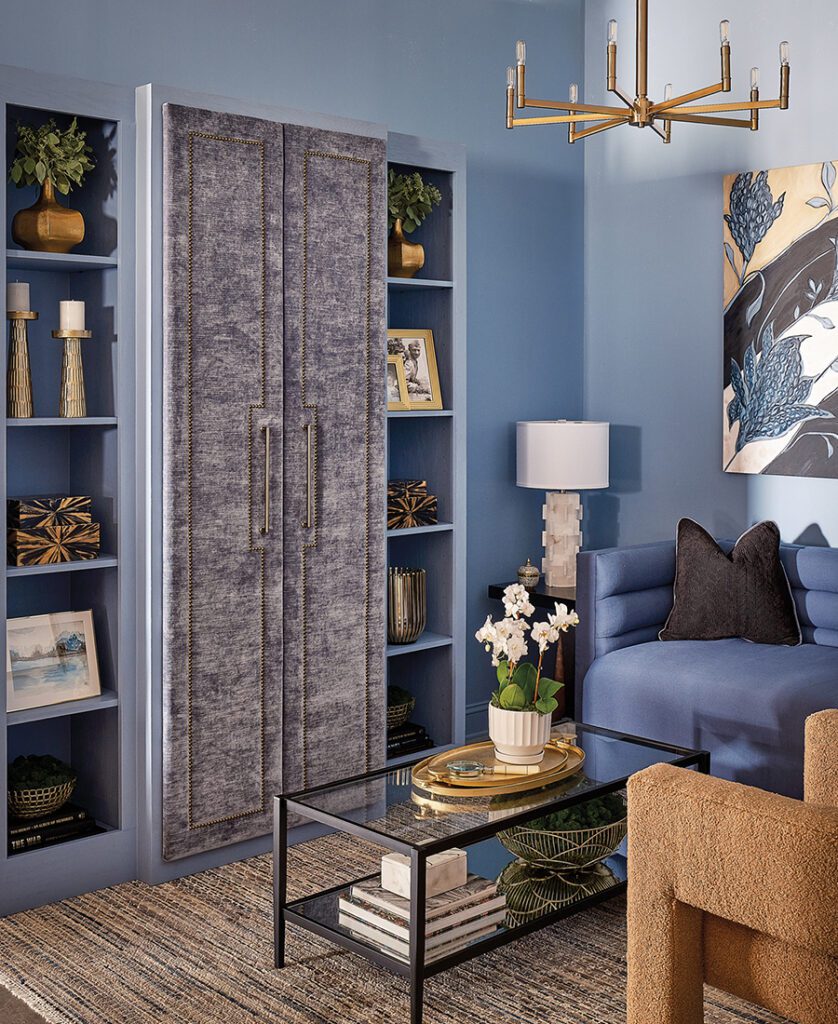 Furnished winner Kristine Franz of Kristine Design designed a vignette with blue hues and a custom bookcase.