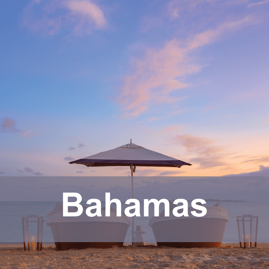 Cover for Bahamas travel story with a pair of chairs on the beach.