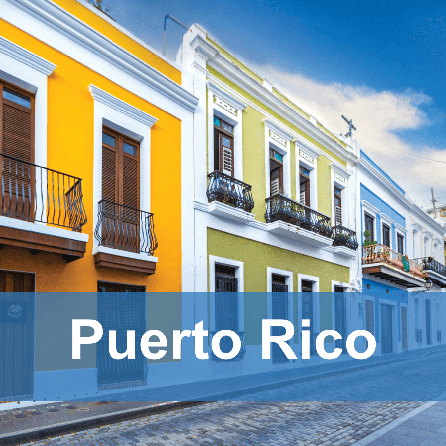 Cover image for Puerto Rico travel story with brightly colored buildings along a street