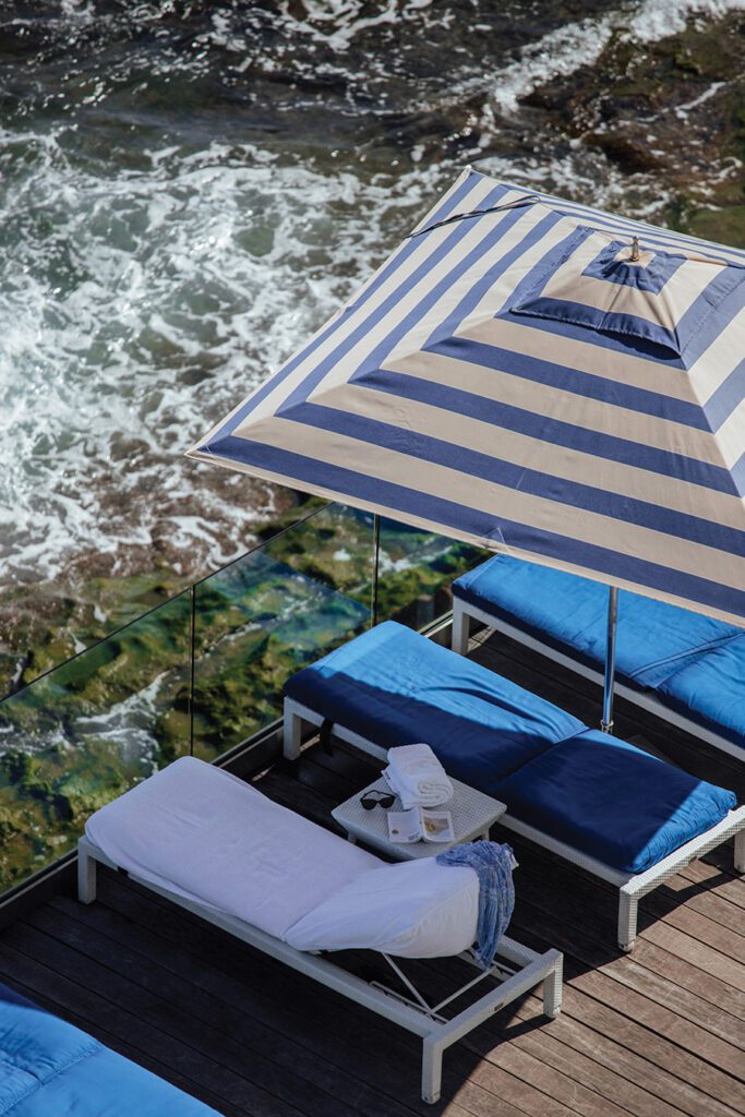 loungers by the ocean at Condado Vanderbilt in Puerto Rico