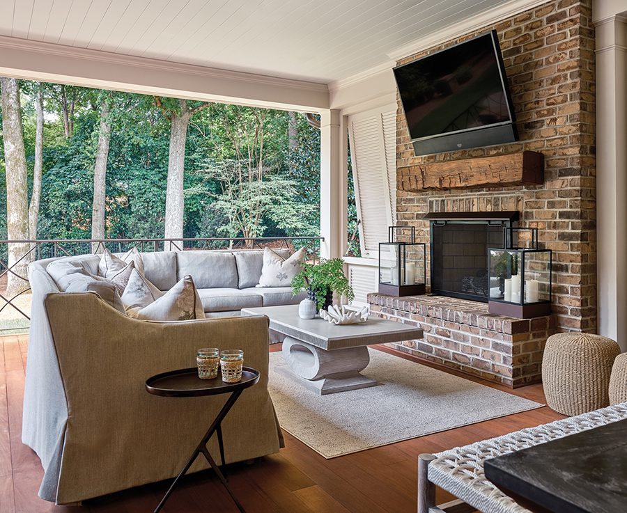 Urban Building Group designed the covered outdoor porch. Sofa from Lane Ventures.