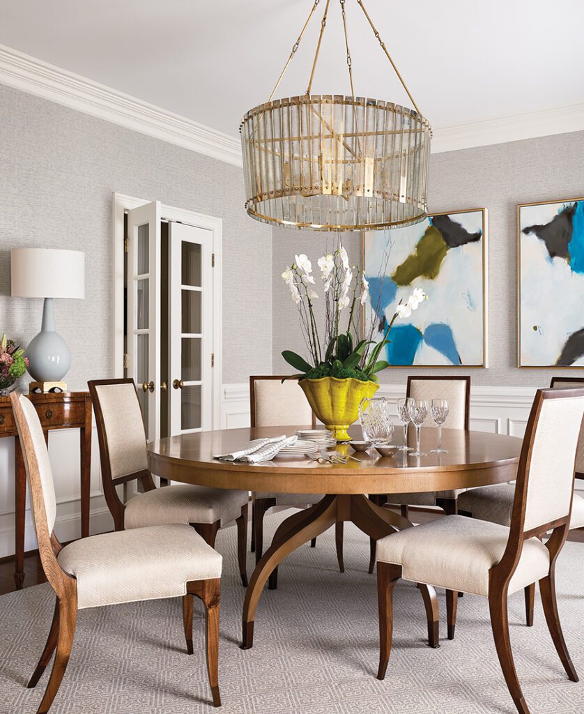 Dining room with diptych by Marcy Gregg, represented by Anne Nielson Fine Art