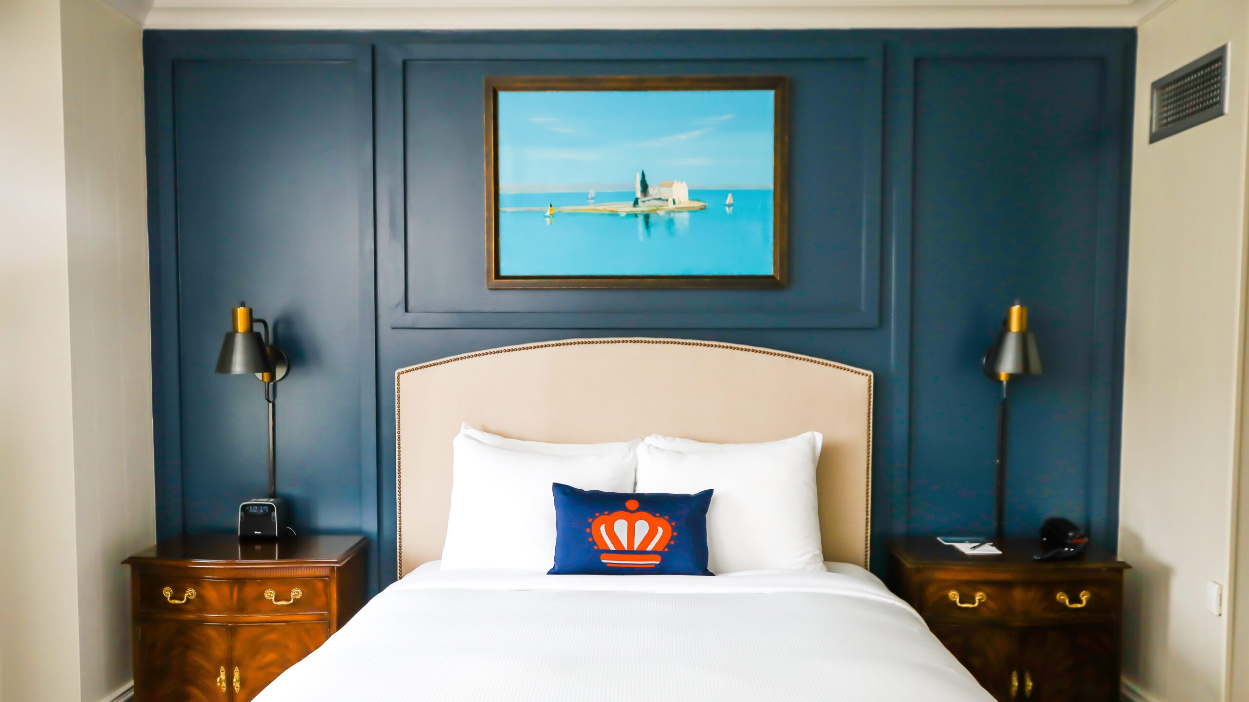 A painting by artist Phillip Moose hangs over the bed at The Dunhill Hotel in uptown Charlotte. 