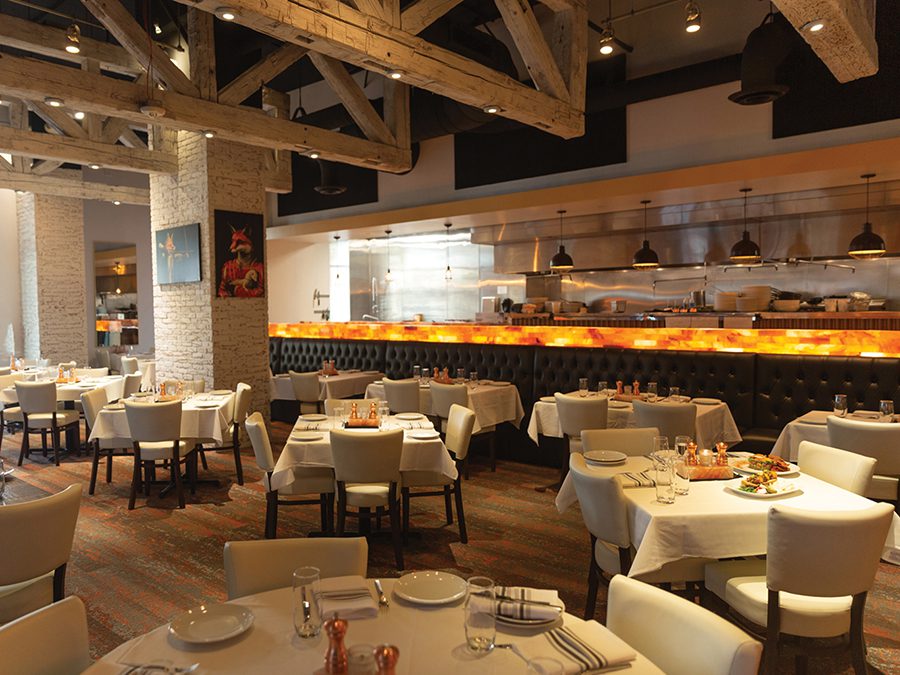 The Fox & Falcon restaurant interior in SouthPark has an elegant, light and modern aesthetic.
