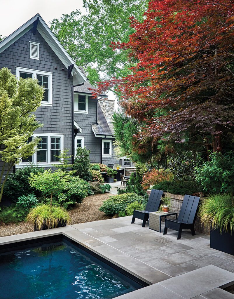 Blair garden pool with chairs and back of house