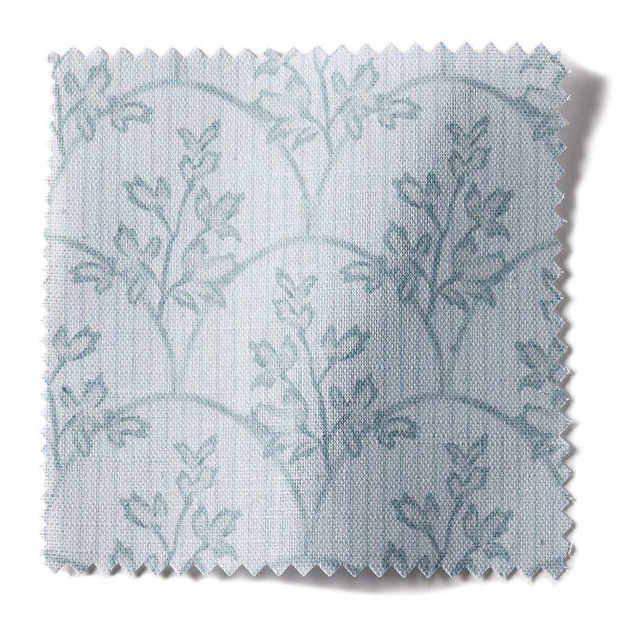A design from Elliston House depicting blue flowers that can used on a wallpaper or fabric.