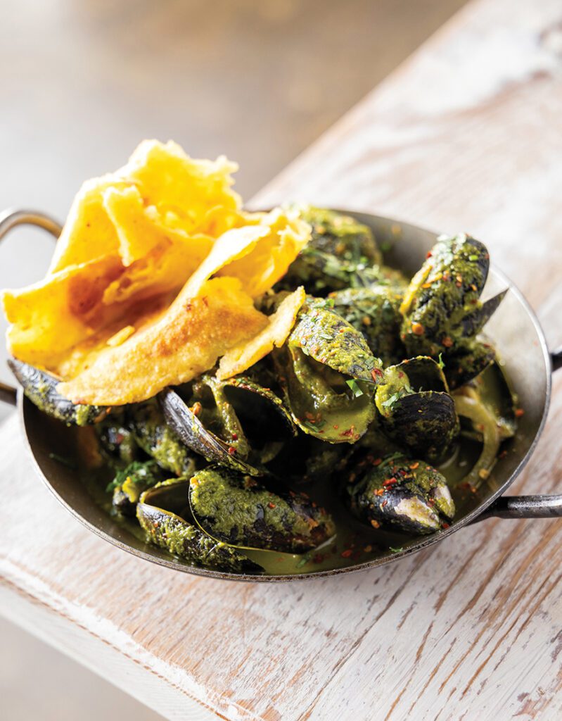 A bowl of curry mussels by Courtney Evans.