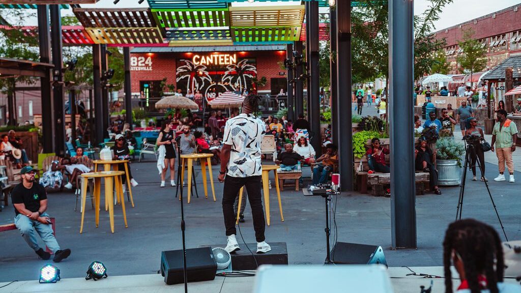 A performer on stage at Camp North End during the Friday concert series in Charlotte.