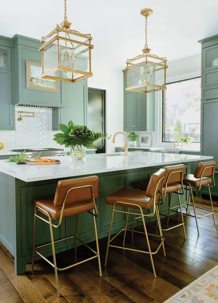House of Drennan green kitchen island and barstools with light fixtures