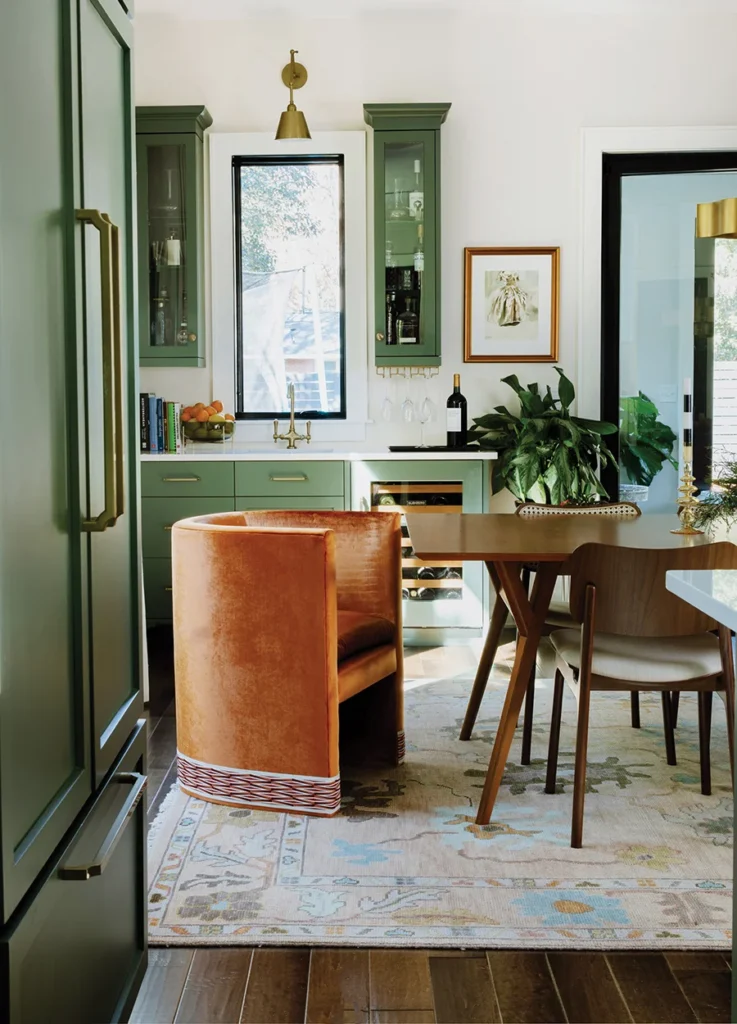 House of Drennan green kitchen wet bar, brown dining chairs