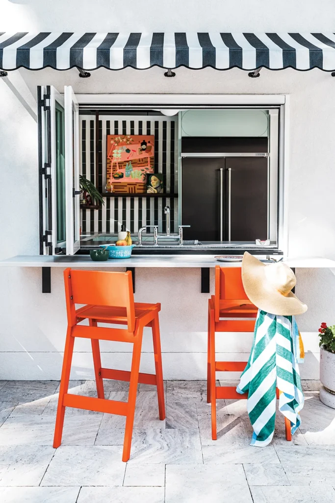 Pool house outdoor orange barstools