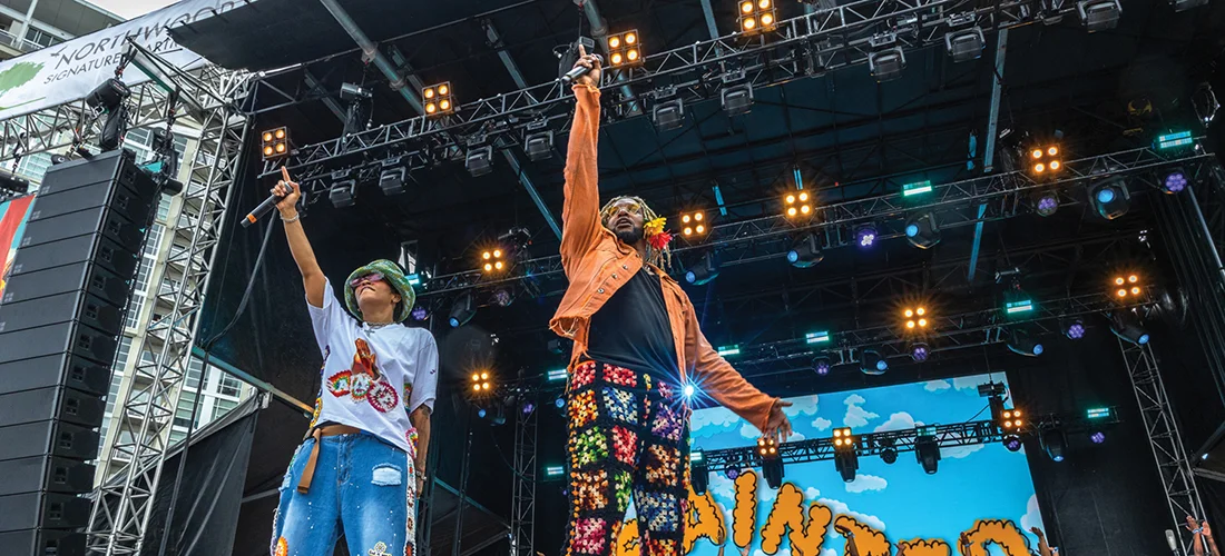 Led by founders DJ Fannie Mae, left, and Dennis Reed Jr., right, Sainted Trap Choir performs at the inaugural Lovin’ Life festival in May