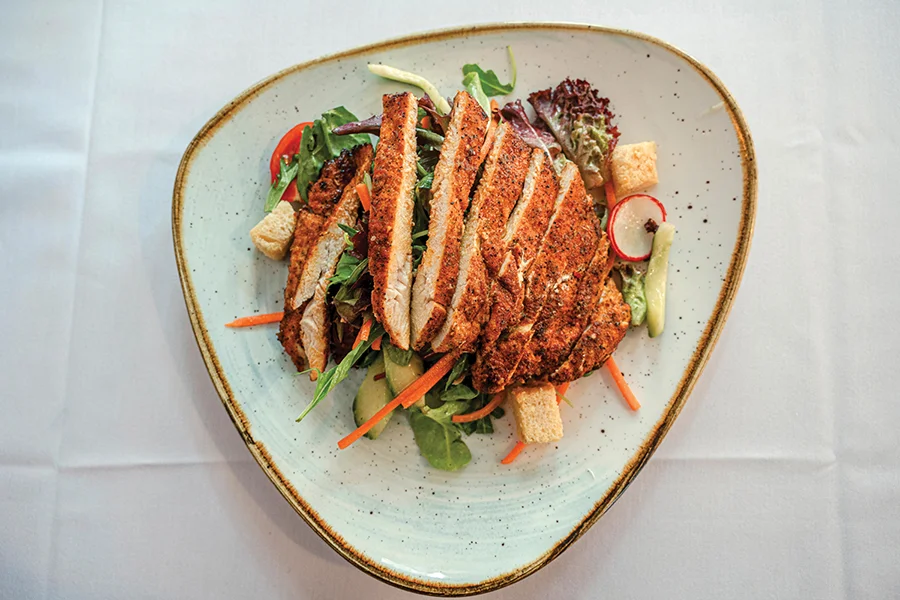 Mista salad with blackened chicken.