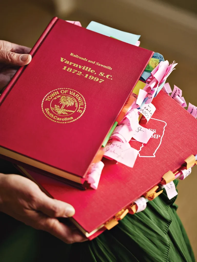 Author Valerie Bauerlein's research books with post-its in them