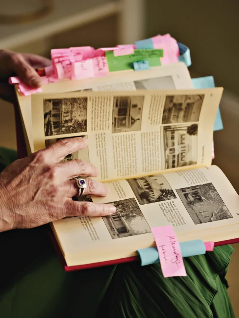 Author Valerie Bauerlein's research books with post-its in them