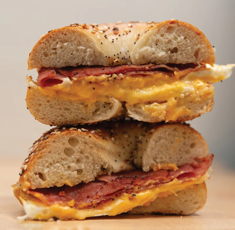Bagel breakfast sandwich with bacon, eggs, and cheese