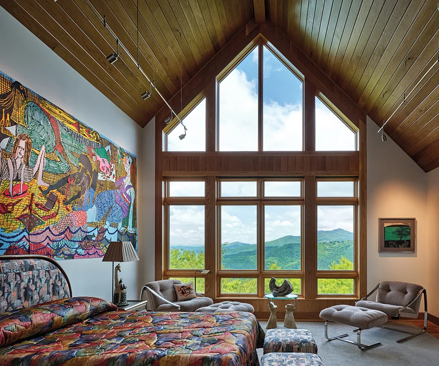 A fellow collector introduced the homeowner to the work of Summer Wheat. “Sand Castles,” a 16-foot painting on wire mesh, depicts women from various eras at work and at play.