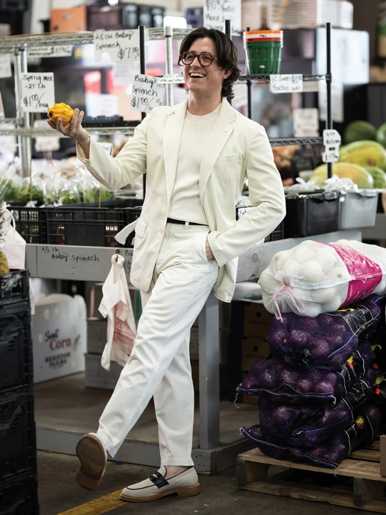 Daniel Gonzalez holding a dragonfruit