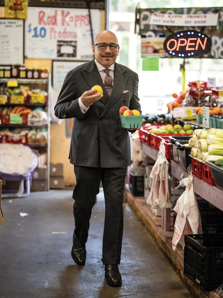 Ricky Coleman holding a basket of peaches