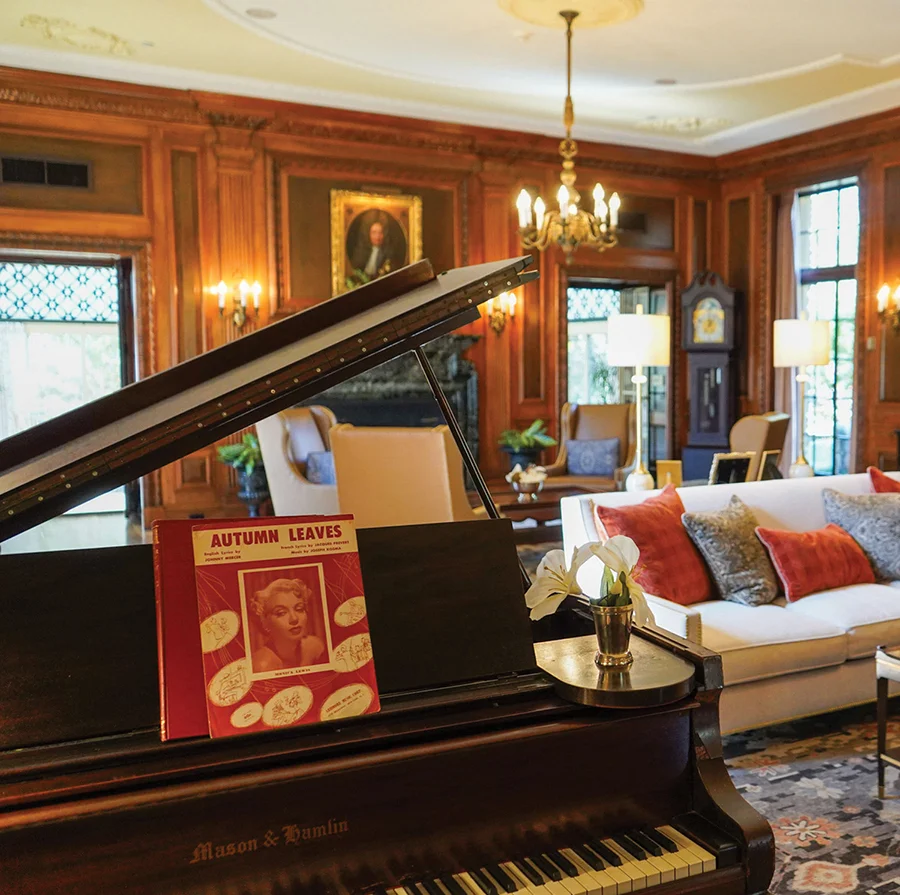 The Graylyn Estate historic estate suite living room with piano in Winston-Salem