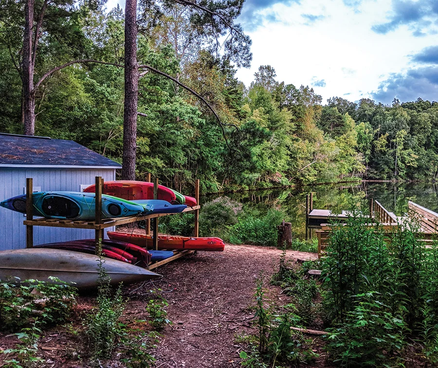 Lakefront photo of kayak rack and dock