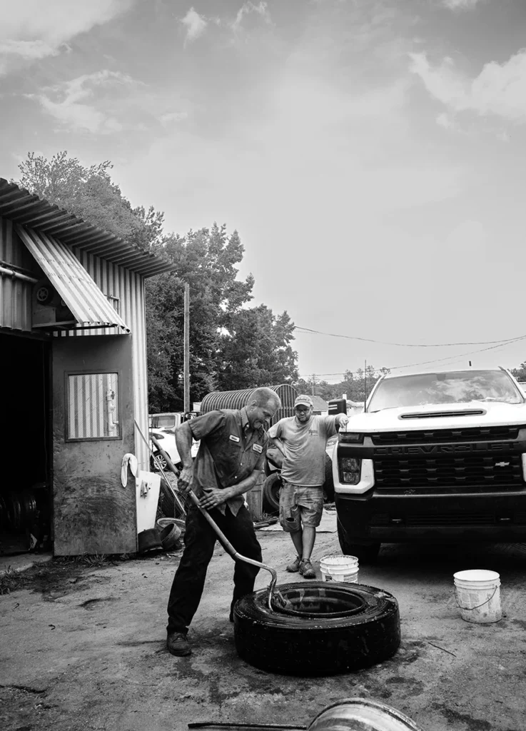 Jason changing a tire