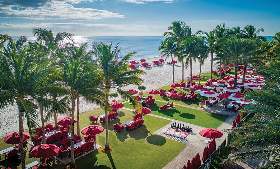 Acqualina beach with red umbrellas