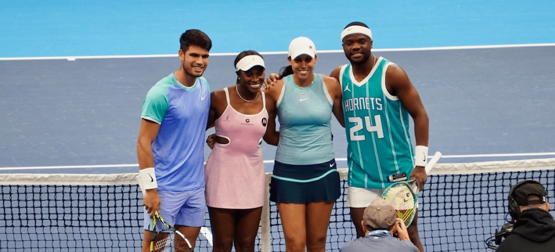 Tennis players Carlos Alcaraz, Sloane Stephens, Madison Keys and Frances Tiafoe pose on the court during the Charlotte Inviational, photo by Ashley Stroehlein