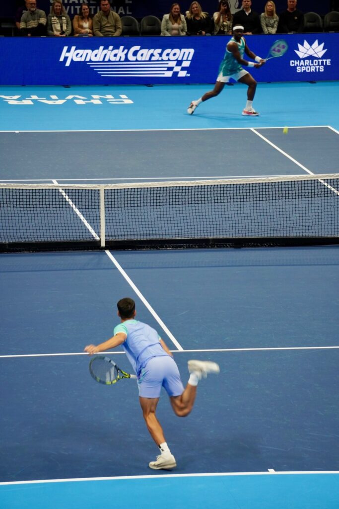 Top-ranked tennis players Frances Tiafoe and Carlos Alcaraz play during the Charlotte Invitational at Spectrum Arena.