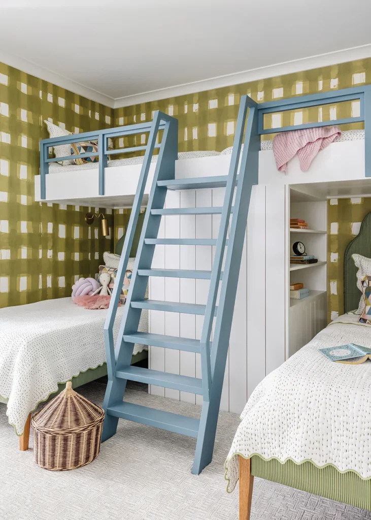 Green plaid wallpaper by Teresa Roche Textiles adds a playful touch in the third-floor bunk room.