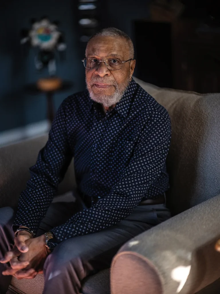 Portrait of Eddie Bell on chair