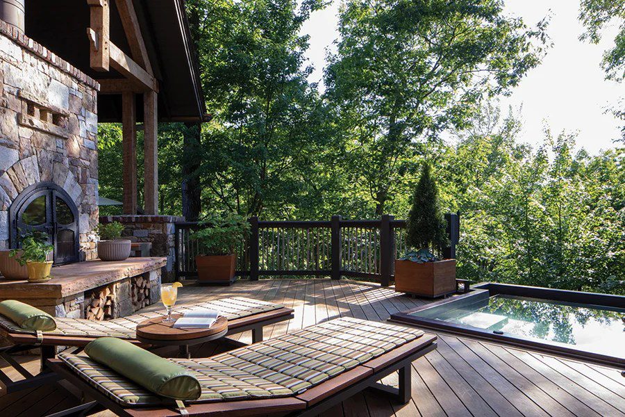 A vacation home's deck and pool at Balsam Mountain Preserve