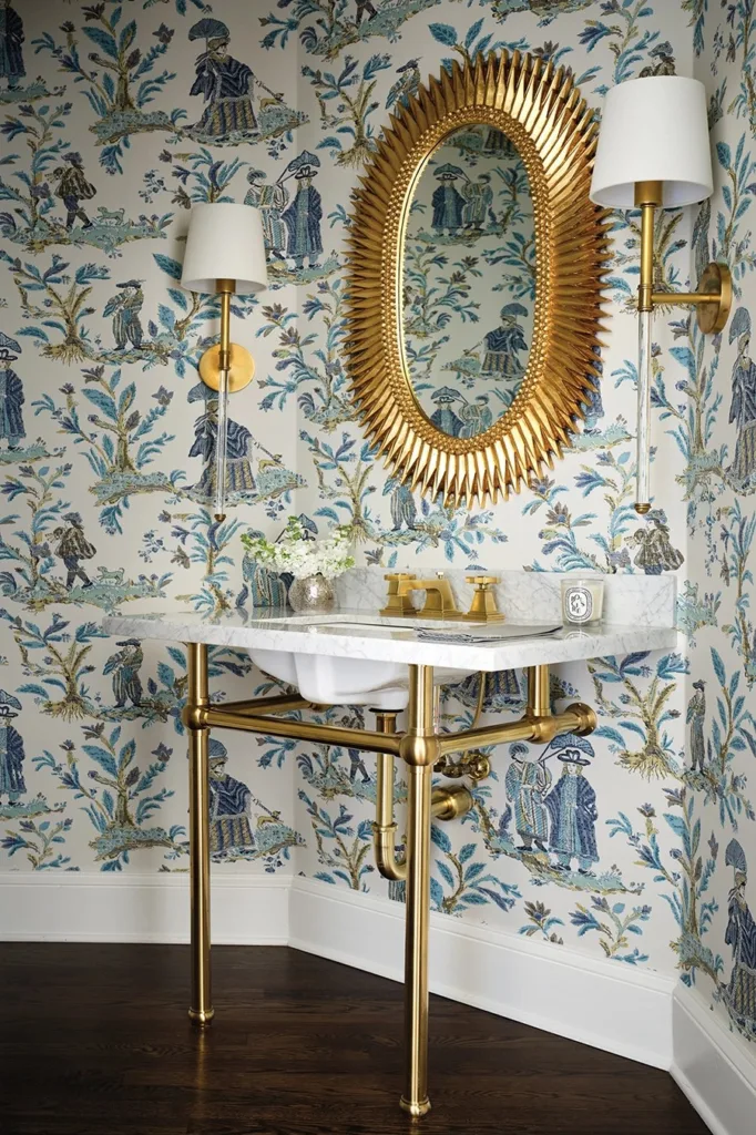 In the powder room, a wall-mounted pedestal sink gives the small space an open feel.