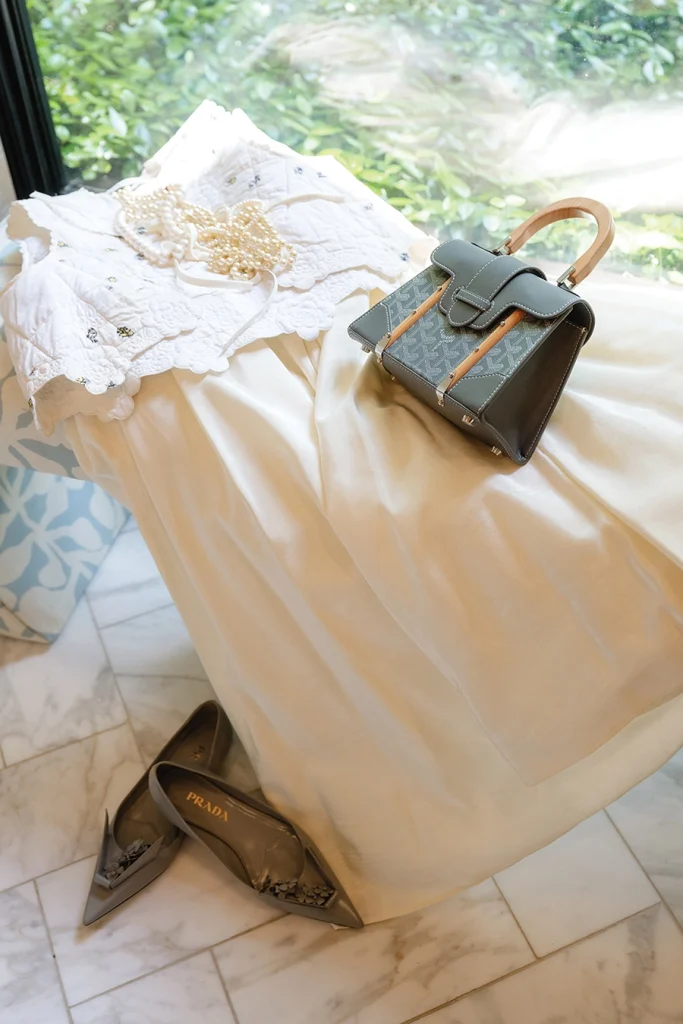 White dress with Prada bag