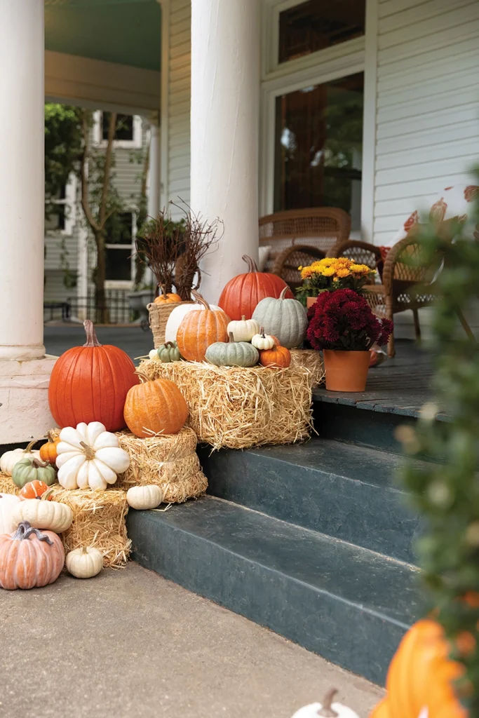 Porch pumpkins and hay